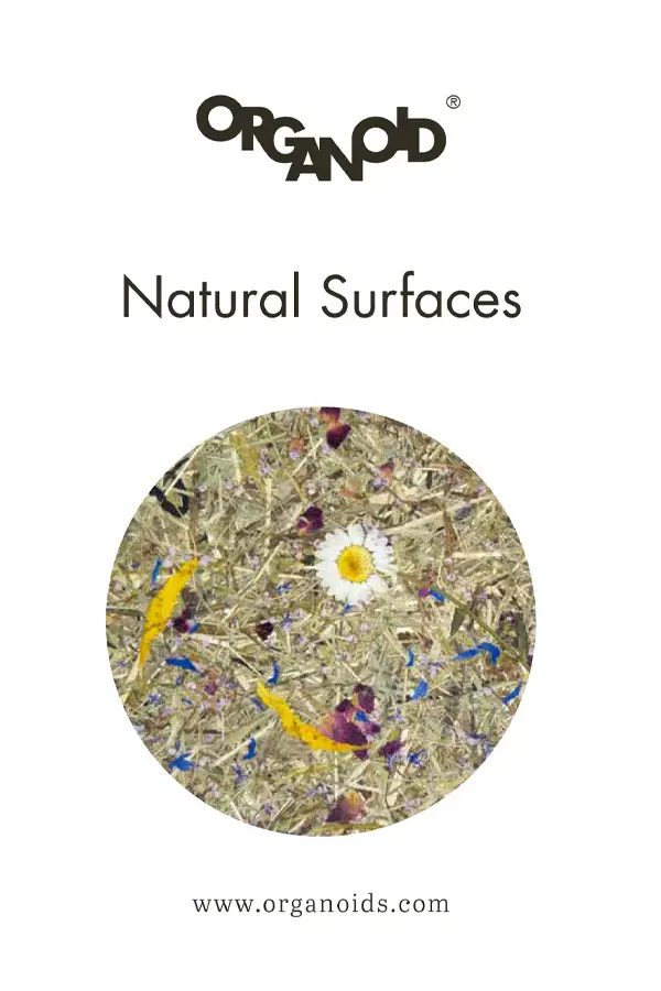 Logo von Organoid, Text "Natural Surfaces" und Bild einer natürlichen Oberfläche mit Blumen und...
